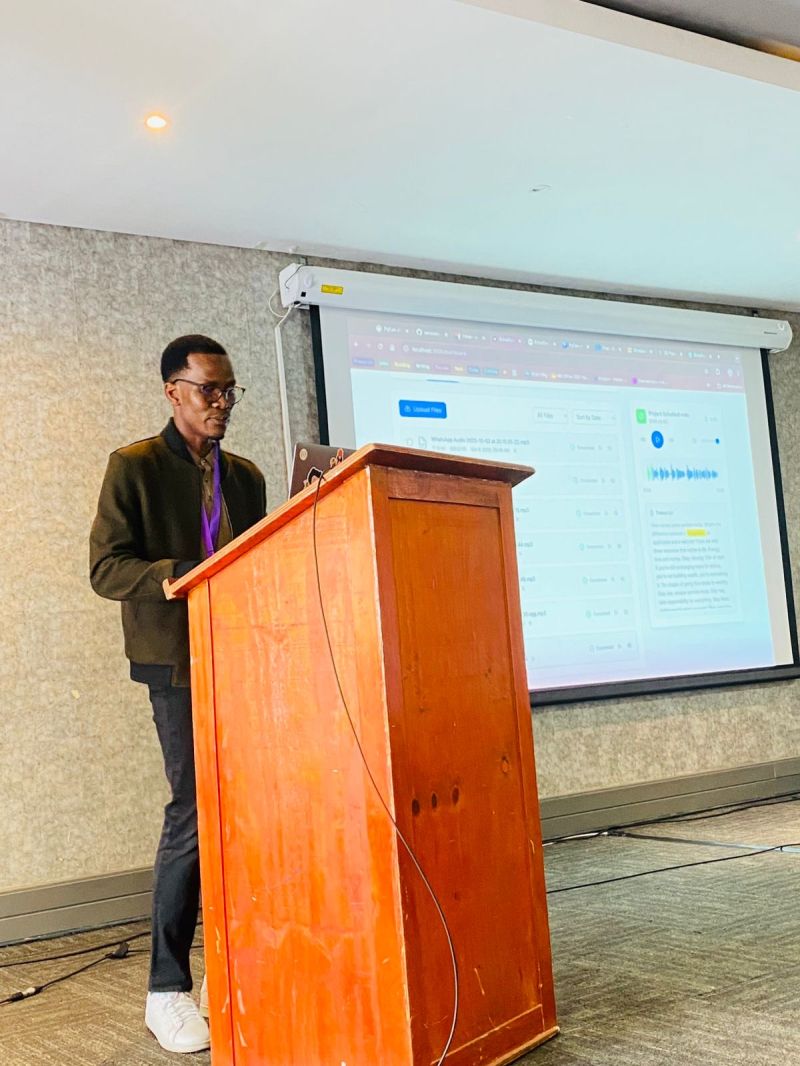 Andile presenting EchoFind at a lectern at PyCon Africa